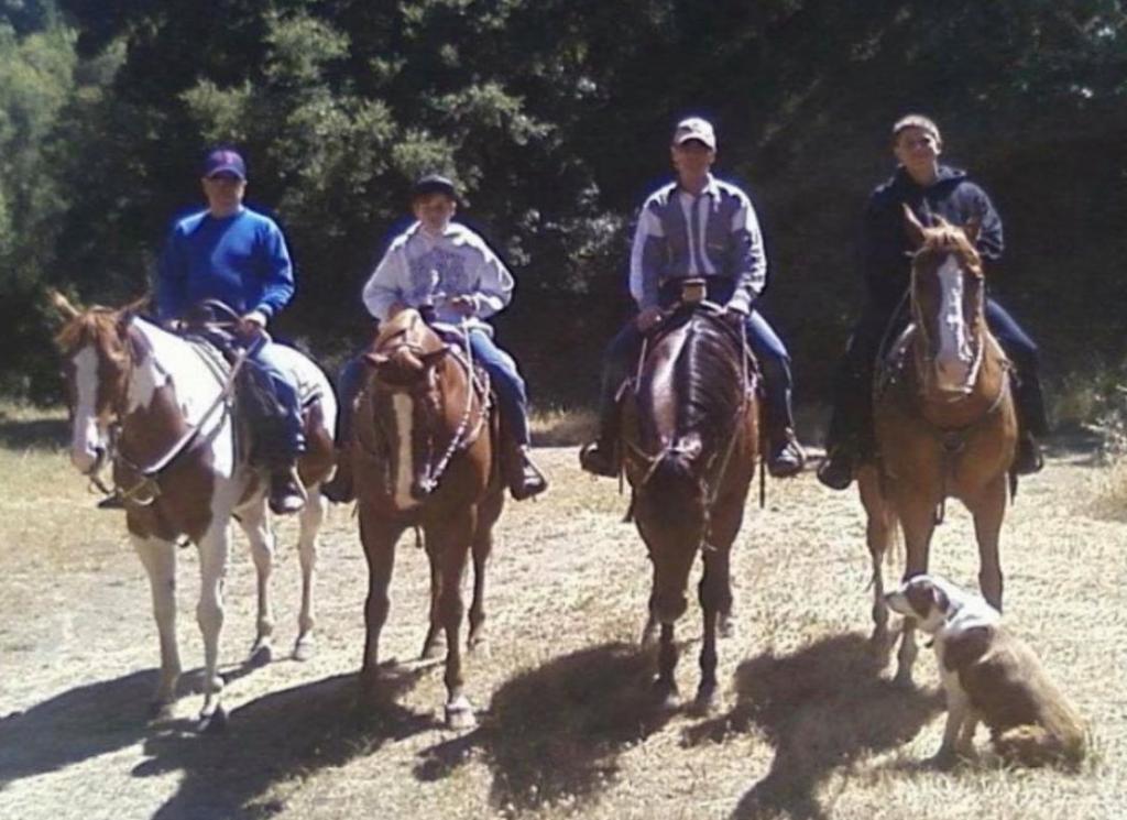 Billy, Taylor at age 12, Mike, and Timy. (Courtesy of Taylor Cambra)